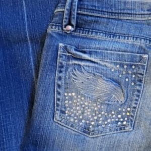 Low ride boot cut embellished jeans